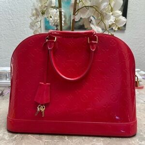 Louis Vuitton pink Vernis Alma Handbag